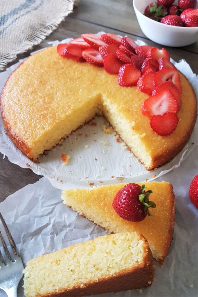 Semolina cake and pieces and strawberries