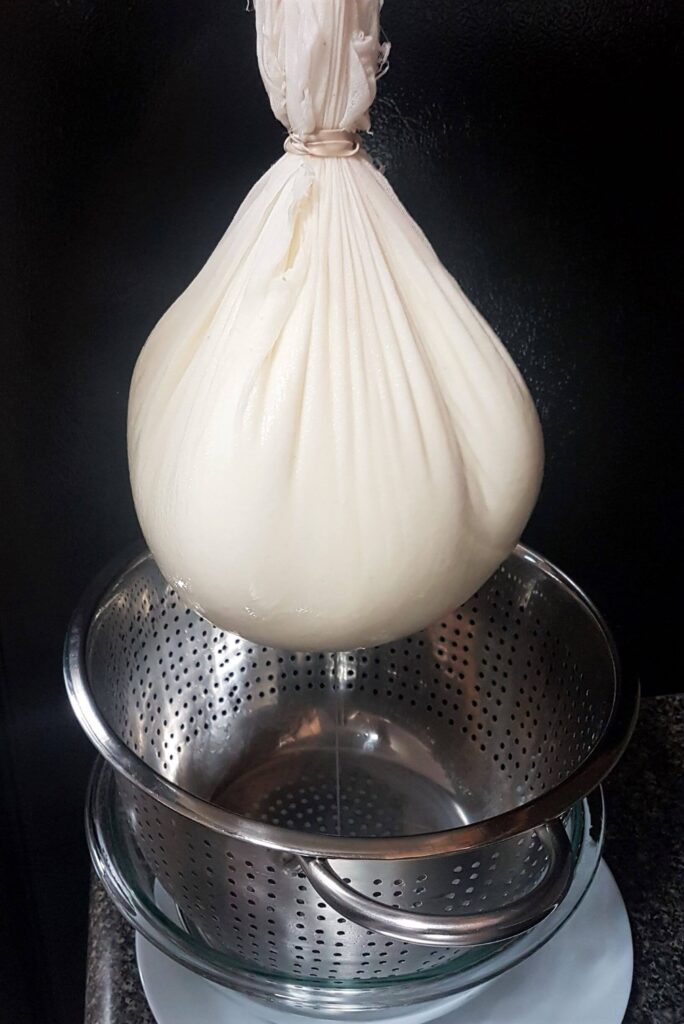 Labneh hanged and draining the whey